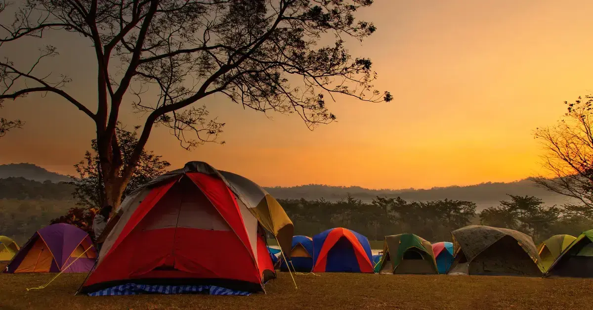 Tents at sunset at Long Lake Camps, a top NY sleepaway camp for 2026 World Soccer Championship families.